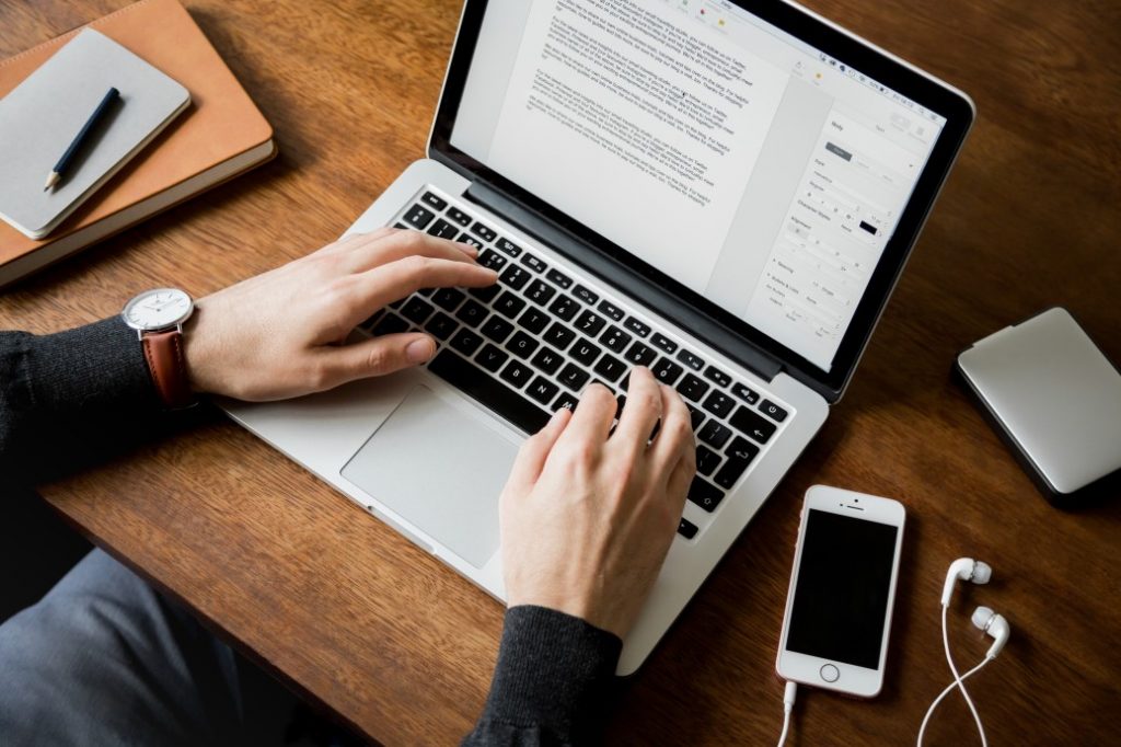 styled-lifestyle-stock-photo-of-a-man-at-a-wooden-desk-typing-on-a-laptop-computer-with-both-hands-a_t20_8ljQXW styled-lifestyle-stock-photo-of-a-man-at-a-wooden-desk-typing-on-a-laptop-computer-with-both-hands-a_t20_8ljQXW